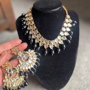 Women black kundan set